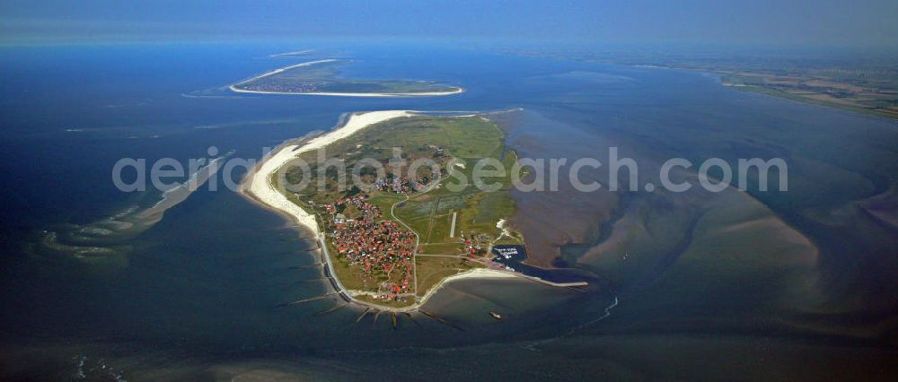 Aerial photograph Baltrum - Blick auf die Insel Baltrum nach Osten. Baltrum ist mit rund 6,5 Quadratkilometern die kleinste der bewohnten Ostfriesichen Inseln. Im Hintergrund die Insel Langeoog. View of the island Baltrum to the east. Baltrum is about 6.5 square kilometers and the smallest of the inhabited East Frisian Islands. In the background the island of Langeoog.