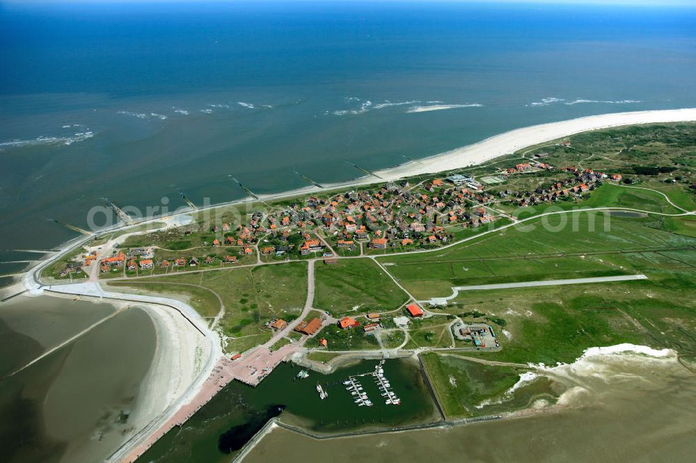 Aerial photograph Baltrum - Baltrum is a barrier island off the coast of East Frisia, in Germany, and is a municipality in the district of Aurich, Lower Saxony. It is located in-between the chain of the seven inhabited East Frisian Islands. Baltrum is the smallest island in this chain by area and inhabitants