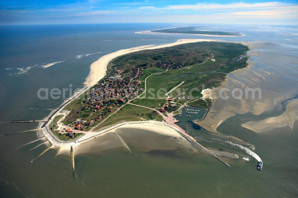 Baltrum from above - Baltrum is a barrier island off the coast of East Frisia, in Germany, and is a municipality in the district of Aurich, Lower Saxony. It is located in-between the chain of the seven inhabited East Frisian Islands. Baltrum is the smallest island in this chain by area and inhabitants