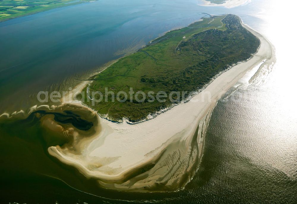 Aerial image Baltrum - Baltrum is a barrier island off the coast of East Frisia, in Germany, and is a municipality in the district of Aurich, Lower Saxony. It is located in-between the chain of the seven inhabited East Frisian Islands. Baltrum is the smallest island in this chain by area and inhabitants