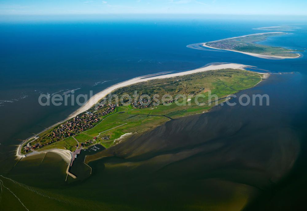 Baltrum from above - Baltrum is a barrier island off the coast of East Frisia, in Germany, and is a municipality in the district of Aurich, Lower Saxony. It is located in-between the chain of the seven inhabited East Frisian Islands. Baltrum is the smallest island in this chain by area and inhabitants