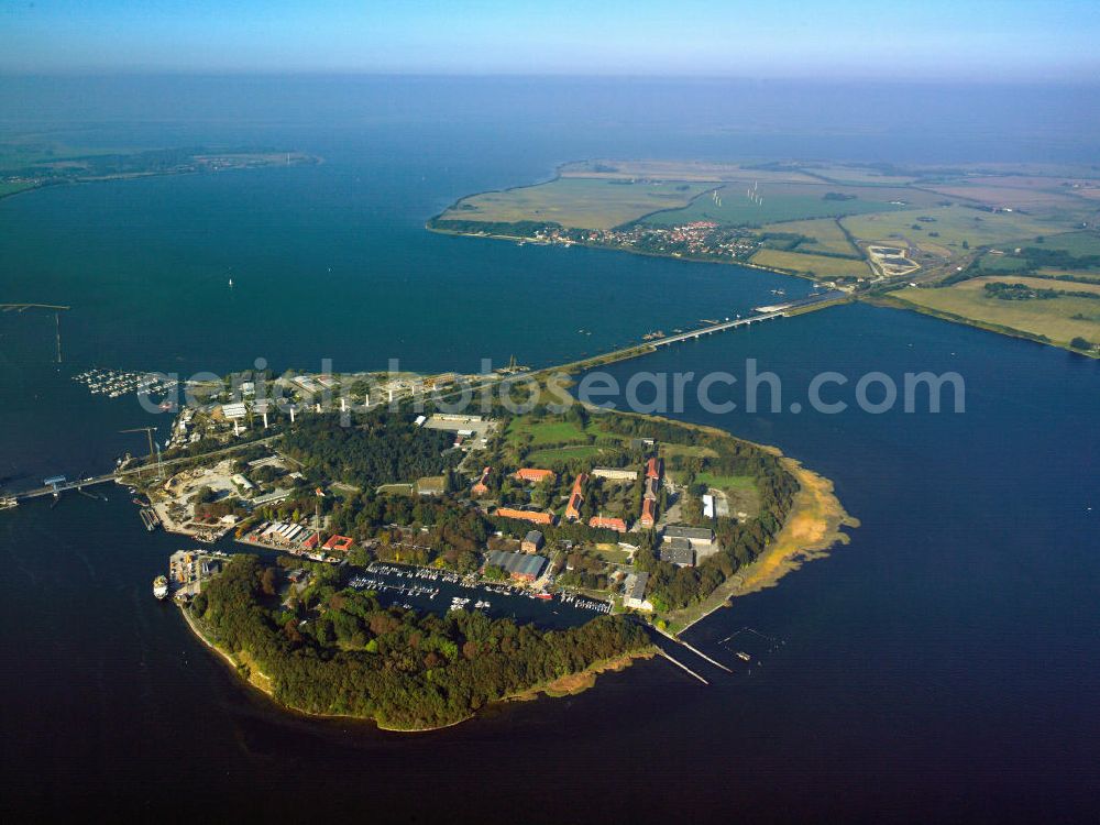 Aerial image Stralsund - Dänholm is a small island on the German coast of the Baltic Sea. It is situated in the Strelasund just east of Stralsund. Both bridges linking Rügen with the mainland, Rügendamm and Rügenbrücke, run over it. The island was the scene of an incident between the Swedish and French armies in 1807, when it belonged to Swedish Pomerania