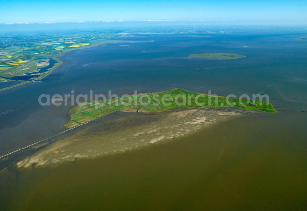 Aerial photograph Oland - Oland is a small hallig which is connected by a narrow gauge railway to the mainland and to hallig Langeneß. Germany's smallest lighthouse is located here, being also the only one with a thatched roof