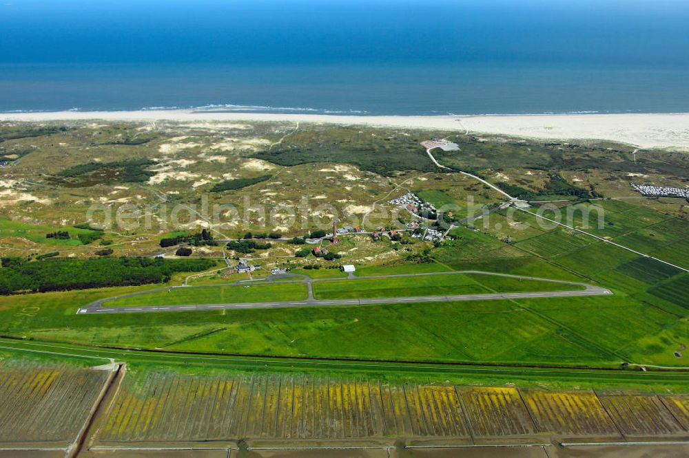 Aerial photograph NORDERNEY - Blick auf die Insel Norderney , eine der Ostfriesischen Inseln im Nordwesten Deutschlands, die dem Festland des Bundeslandes Niedersachsen zwischen der Ems- und Wesermündung in der Deutschen Bucht vorgelagert sind. Mit einer Fläche von 26,29 Quadratkilometern ist Norderney nach Borkum die zweitgrößte Insel dieser Inselgruppe und gehört zum zum Nationalpark Niedersächsisches Wattenmeer. Norderney Island, one of the East Frisian Islands in the north-west Germany