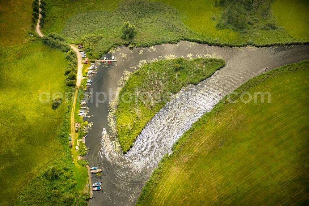 Schönfeld from above - Island on the banks of the river course of the river Peene and the water wan der rest area Trittelwitz in Schoenfeld in the state Mecklenburg - Western Pomerania