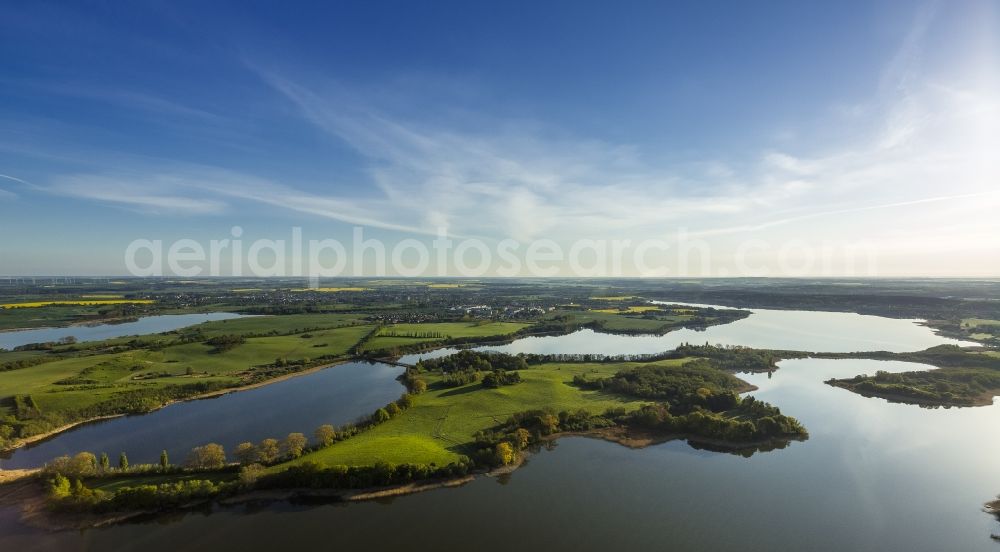 Güstrow from the bird's eye view: View of the lake Inselsee near Guestrow in the state Mecklenburg-West Pomerania