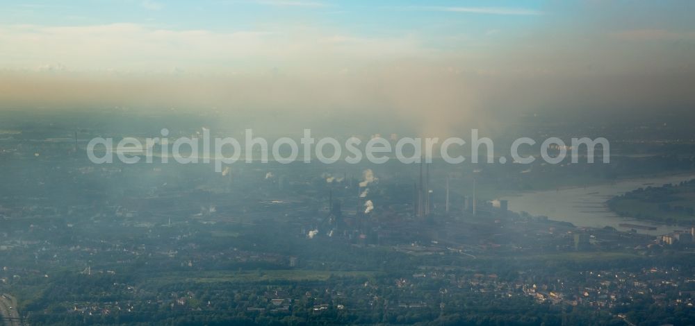 Aerial image Duisburg - Inversion - Weather conditions at the horizon above the industrial area of Duisburg at a bight of the river rhine in the state North Rhine-Westphalia