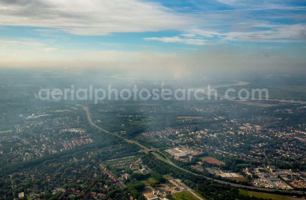 Aerial image Duisburg - Inversion - Weather conditions at the horizon above the industrial area of Duisburg at a bight of the river rhine in the state North Rhine-Westphalia