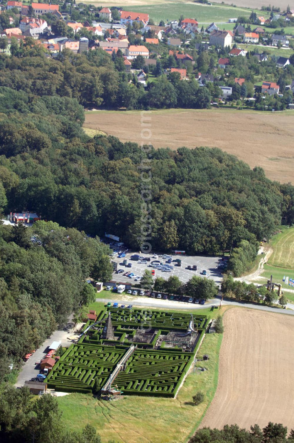 Aerial photograph Bautzen - Blick auf den Irrgarten in Kleinwelka in der Nähe von Bautzen mit Abenteuerspielplatz. Das Labyrinth entstand 1992 auf einem ehemaligen Rapsfeld. Geöffnet hat das Labyrinth von März bis November. Kontakt: Regina Frenzel, Tel. +49(0)35935 20575, +49(0)35935 21575, Email: info@irrgarten-kleinwelka.de