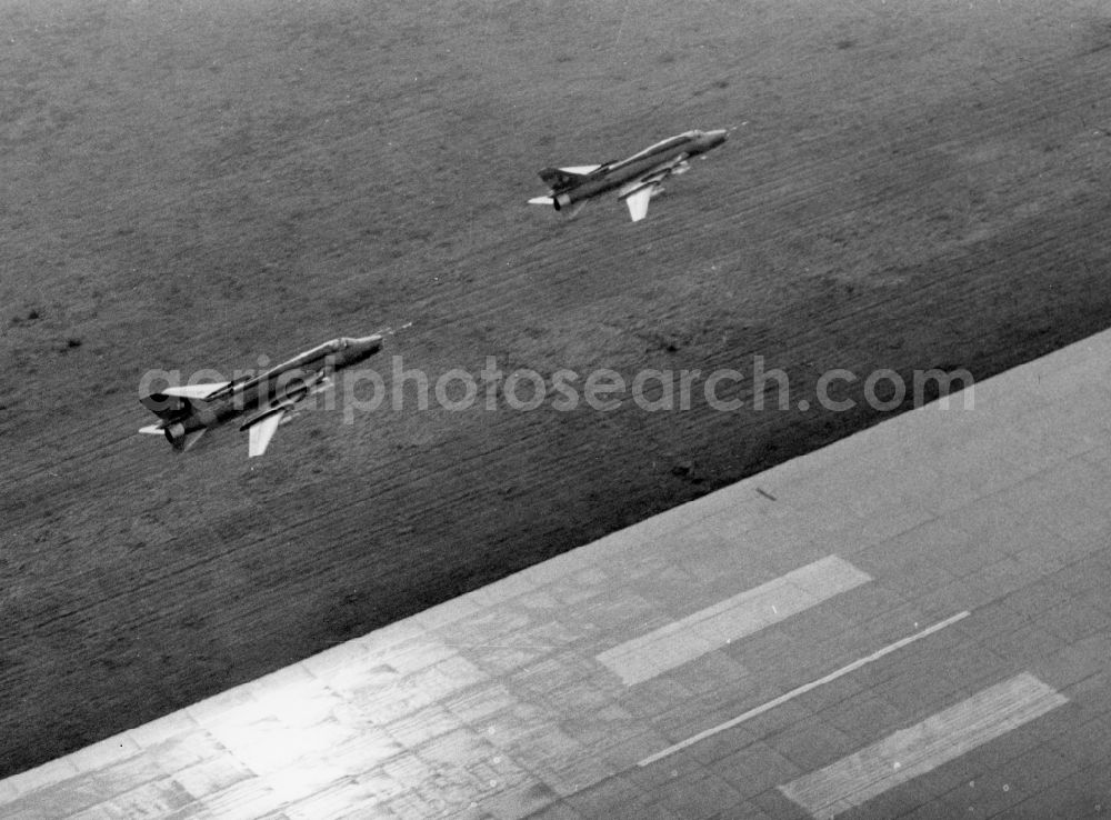 Laage from the bird's eye view: SU-22 fighter-bombers at the airport of the GDR Air Force / Air Defense LSK / LV of the NVA at Laage in Mecklenburg - West Pomerania