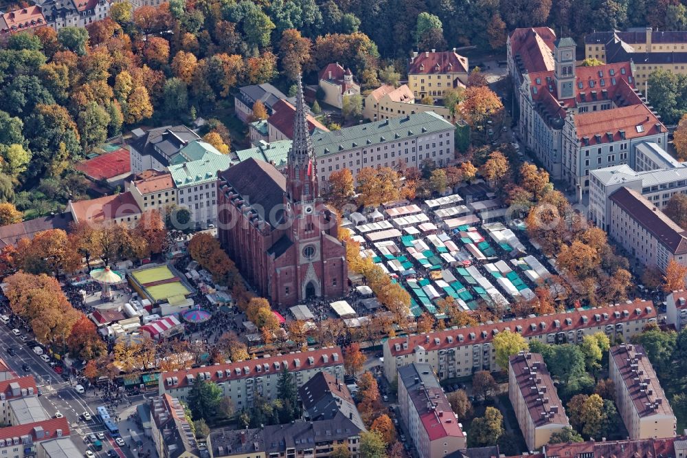 München from the bird's eye view: Event facilities at the Volksfest Auer Dult on the Mariahilfplatz at the Mariahilf church in the city district of Au in Munich, Bavaria. The Herbstdult is also called Kirchweihdult