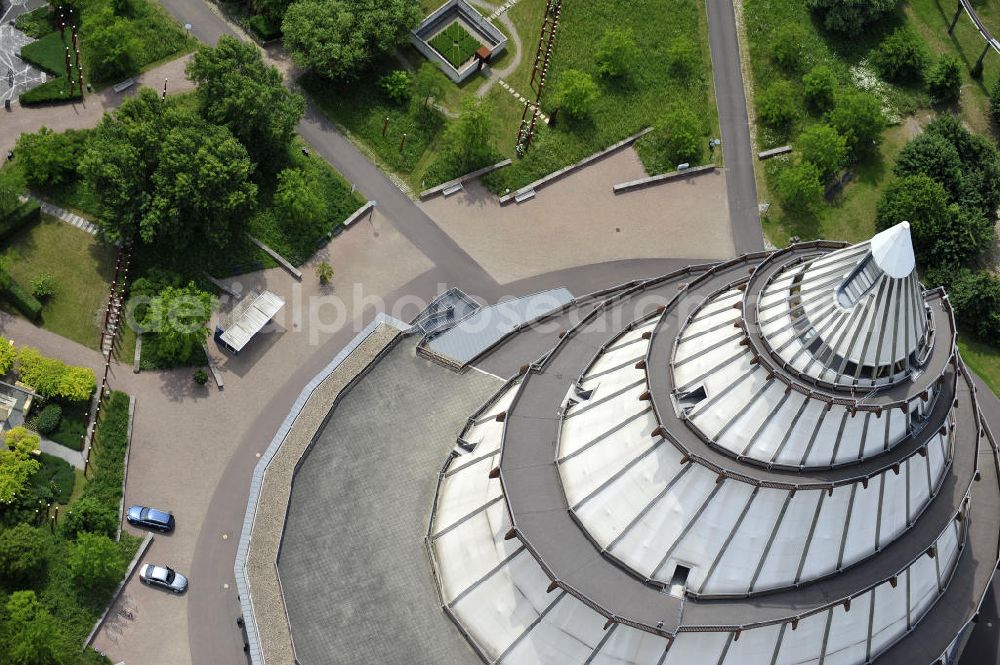 Magdeburg from above - Blick auf den Jahrtausendturm im Elbauenpark, auch als die BUGA - Pyramide bekannt. Der Jahrtausendturm in Magdeburg ist mit 60 Metern Höhe das höchste Holzgebäude Deutschlands und wurde anlässlich der Bundesgartenschau 1999 errichtet. Betreiber ist die Messe- und Veranstaltungsgesellschaft Magdeburg GmbH. View of the Millennium Tower in Elbauenpark. The Millennium Tower in Magdeburg is 60 meters is the tallest wooden building in Germany and was built at the Federal Garden Show 1999th