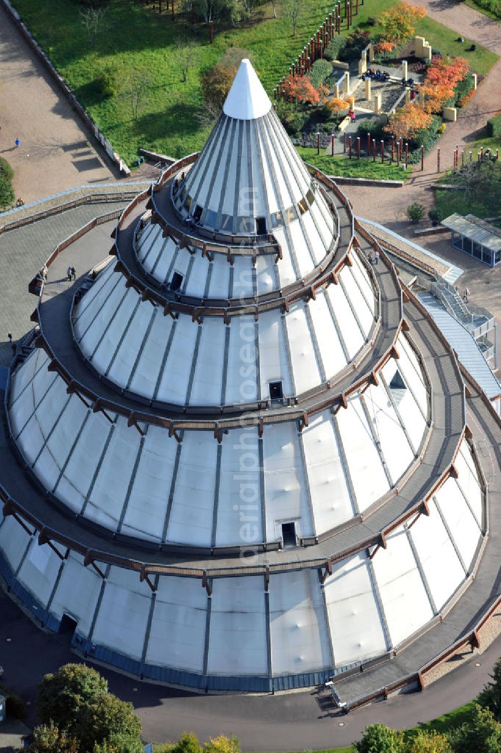 Aerial photograph Magdeburg - Der Jahrtausendturm im Elbauenpark in Sachsen-Anhalt, ist auch als die BUGA - Pyramide bekannt. Der Jahrtausendturm in Magdeburg ist mit 60 Metern Höhe das höchste Holzgebäude Deutschlands. Betreiber ist die Messe- und Veranstaltungsgesellschaft Magdeburg GmbH. View of the Millennium Tower in Elbauenpark. The Millennium Tower in Magdeburg is 60 meters and it is the tallest wooden building in Germany.