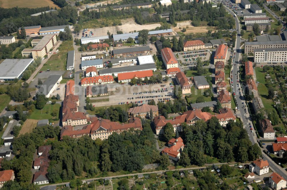 Löbau from above - Blick auf die ehemalige Jägerkaserne in Löbau in Sachsen. Löbau befindet sich in der Oberlausitz und ist eine Große Kreisstadt im Landkreis Görlitz. Die Jägerkaserne wurde bis 1990 als Offiziershochschule der Landstreitkräfte der NVA Ernst Thälmann genutzt. Heute stehen die Gebäude am Wilhelm-Leuschner-Platz unter Denkmalschutz und werden von verschiedenen Investoren genutzt. Achim Walderpräsenz: