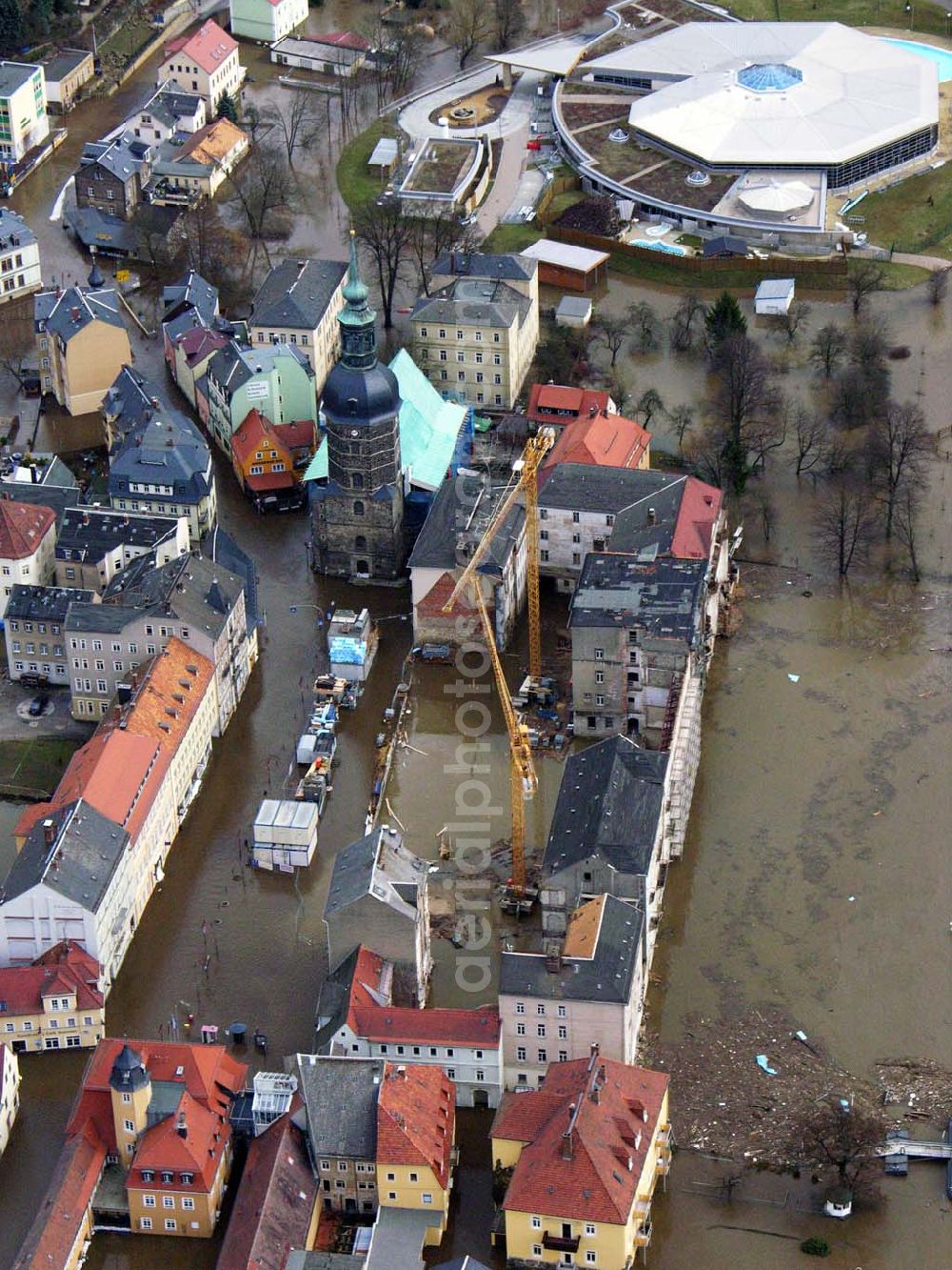 Aerial image Bad Schandau - 31.03.2006 Bad Schandau; Hochwasser in Bad Schandau durch die Elbe. Toskana Therme Bad Schandau, Rudolf-Sendig-Straße 8a, 01814 Bad Schandau; Evangelisch-Lutherische Johanniskirche, Bad Schandau, Markt Telefon 03 50 22 / 4 23 96