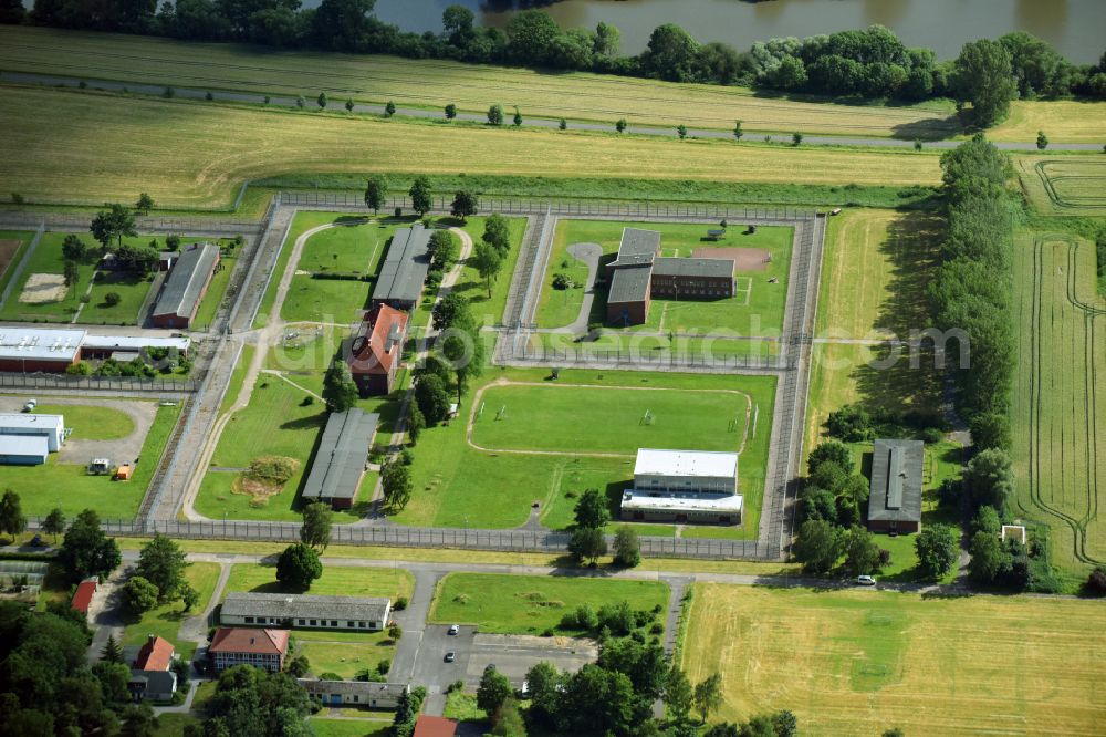 Jork from above - Prison grounds and high security fence Prison on the island in the course of the Elbe river in the district Hahnoefersand in Jork Old Land in the state Lower Saxony, Germany