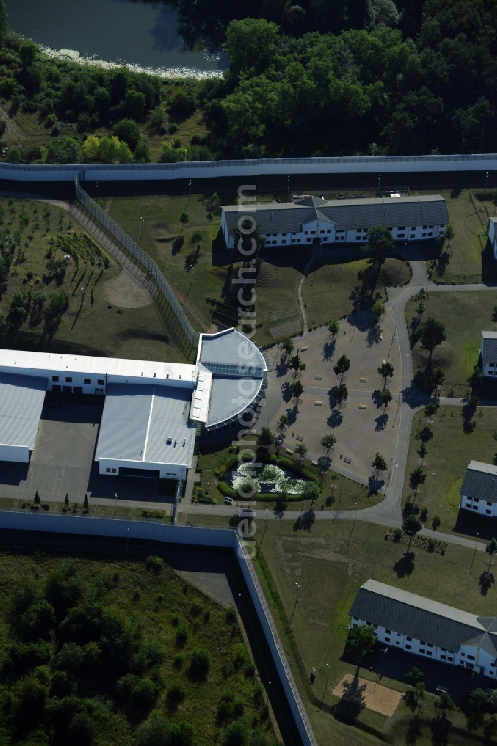 Neustrelitz from the bird's eye view: Prison grounds and high security fence Prison on Kaulksee in the district Fuerstensee in Neustrelitz in the state Mecklenburg - Western Pomerania, Germany