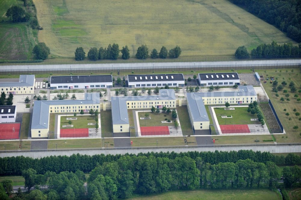 Wulkow from the bird's eye view: Prison grounds and high security fence Prison Justizvollzugsanstalt Nord-Brandenburg Teilanstalt Neuruppin-Wulkow in Wulkow in the state Brandenburg, Germany