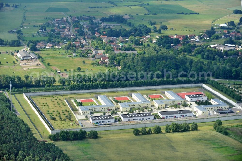 Aerial image Wulkow - Prison grounds and high security fence Prison Justizvollzugsanstalt Nord-Brandenburg Teilanstalt Neuruppin-Wulkow in Wulkow in the state Brandenburg, Germany