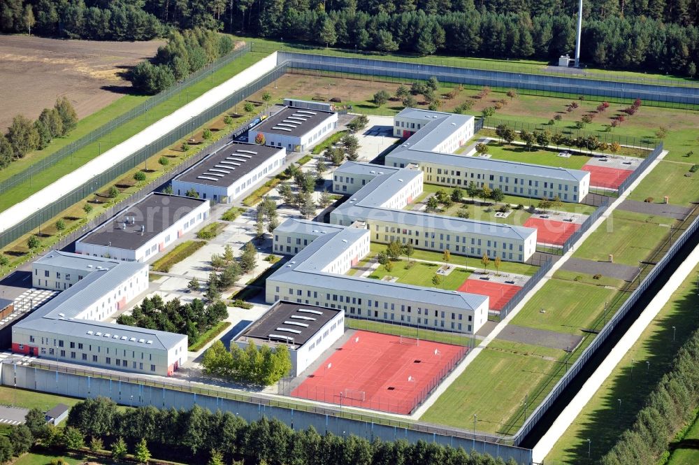 Wulkow from the bird's eye view: Prison grounds and high security fence Prison Justizvollzugsanstalt Nord-Brandenburg Teilanstalt Neuruppin-Wulkow in Wulkow in the state Brandenburg, Germany