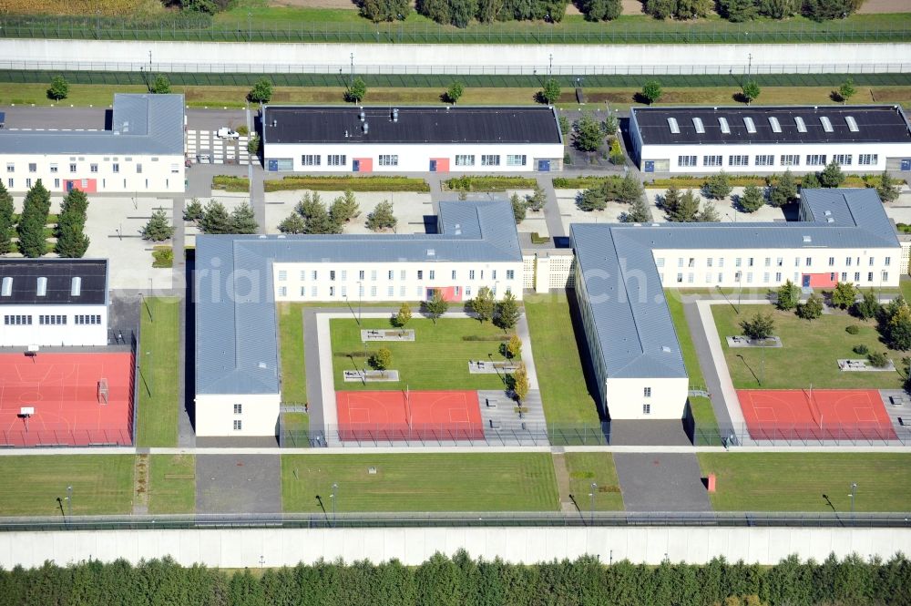 Wulkow from the bird's eye view: Prison grounds and high security fence Prison Justizvollzugsanstalt Nord-Brandenburg Teilanstalt Neuruppin-Wulkow in Wulkow in the state Brandenburg, Germany