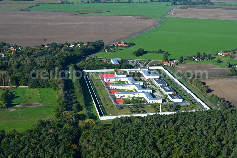 Wulkow from the bird's eye view: Prison grounds and high security fence Prison Justizvollzugsanstalt Nord-Brandenburg Teilanstalt Neuruppin-Wulkow in Wulkow in the state Brandenburg, Germany