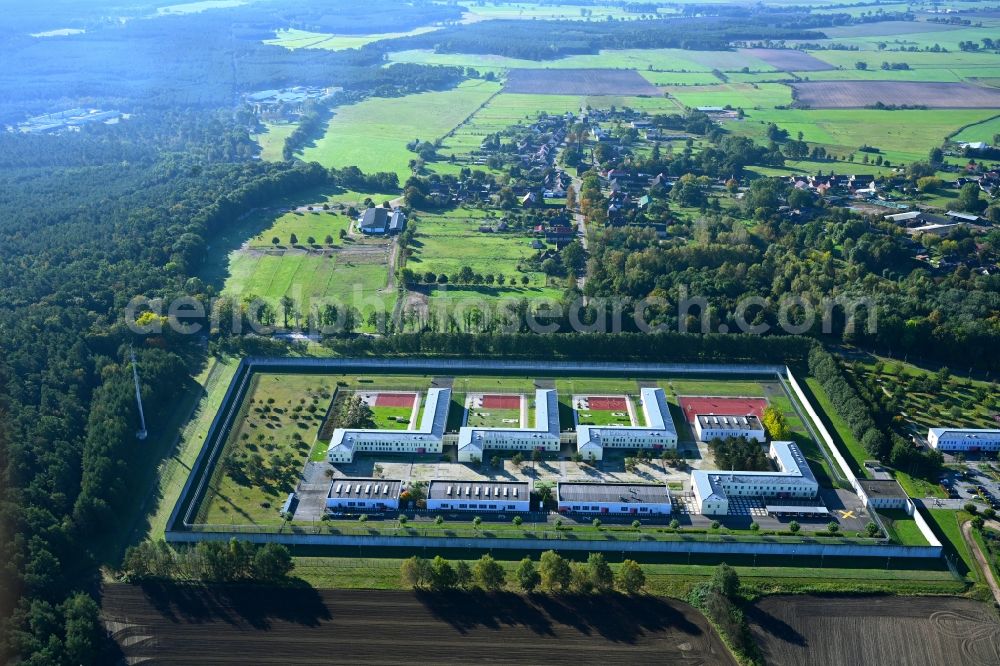 Wulkow from the bird's eye view: Prison grounds and high security fence Prison Justizvollzugsanstalt Nord-Brandenburg Teilanstalt Neuruppin-Wulkow in Wulkow in the state Brandenburg, Germany