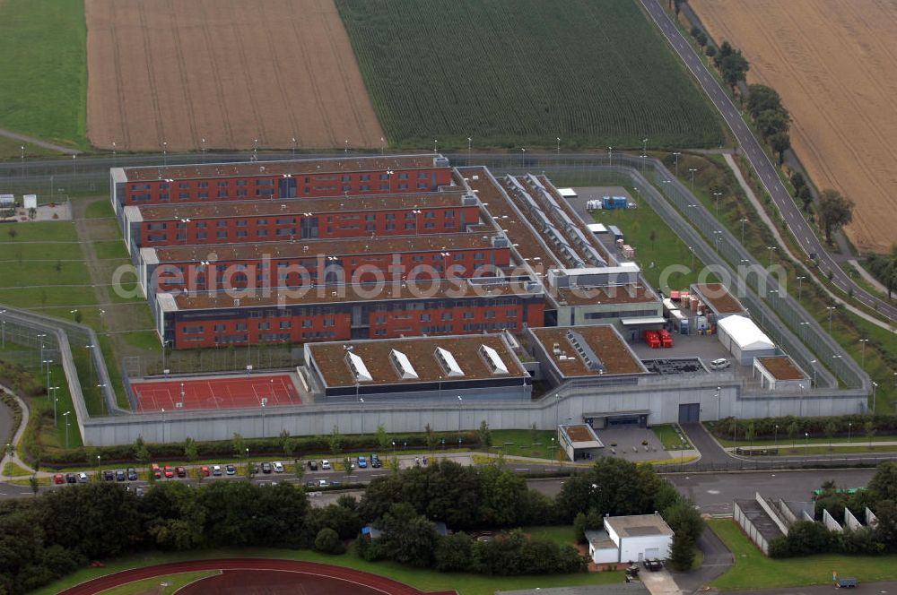 Aerial image Hünfeld - Blick auf die JVA Hünfeld. Die Justizvollzugsanstalt Hünfeld ist die erste teilWolfgang Gerberisierte Justizvollzugsanstalt in Deutschland. Sie bietet 502 Haftplätze. Planung, Errichtung, Versorgungs- und Betreuungsmanagement sowie bestimmte Teile des Bewachungs- und Kontrollmanagements wie beispielsweise die tägliche Kontrolle der Funktionsfähigkeit der Sicherungsanlagen liegen in Wolfgang Gerberer Hand. Kontakt: Tel. +49(0)6652 91130, Email: poststelle@jva-huenfeld.justiz.hessen.de