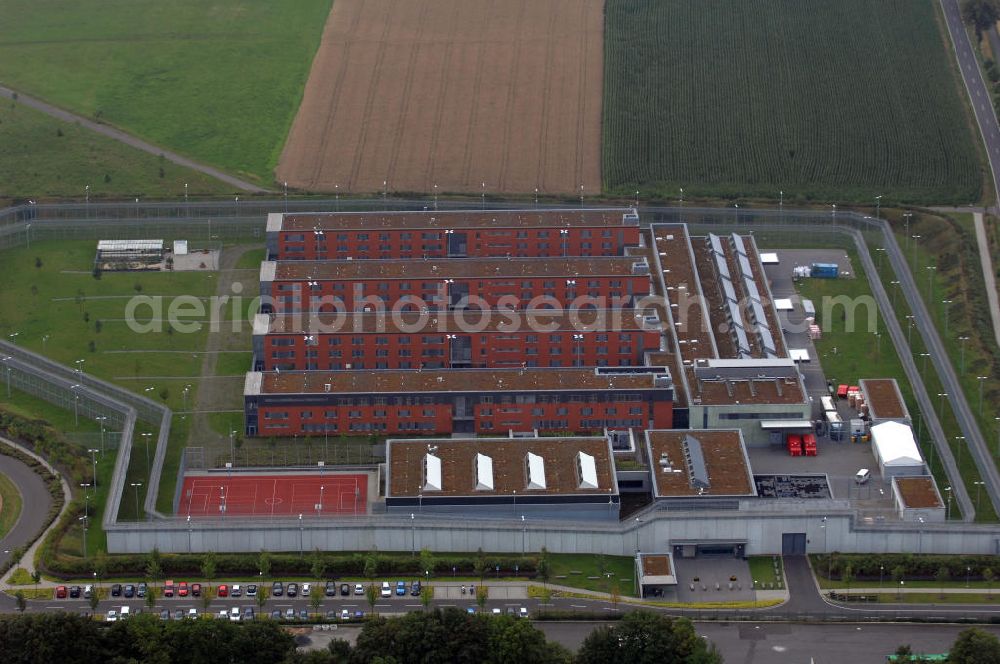 Aerial photograph Hünfeld - Blick auf die JVA Hünfeld. Die Justizvollzugsanstalt Hünfeld ist die erste teilWolfgang Gerberisierte Justizvollzugsanstalt in Deutschland. Sie bietet 502 Haftplätze. Planung, Errichtung, Versorgungs- und Betreuungsmanagement sowie bestimmte Teile des Bewachungs- und Kontrollmanagements wie beispielsweise die tägliche Kontrolle der Funktionsfähigkeit der Sicherungsanlagen liegen in Wolfgang Gerberer Hand. Kontakt: Tel. +49(0)6652 91130, Email: poststelle@jva-huenfeld.justiz.hessen.de