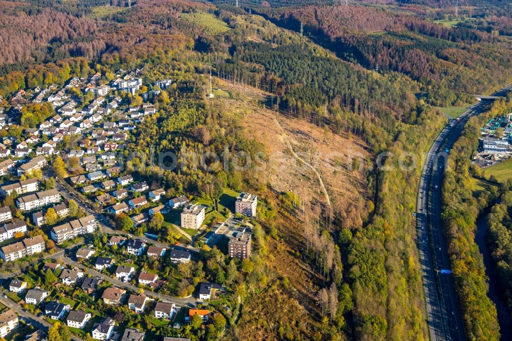 Aerial photograph Arnsberg - Bald area of a cleared forest overlooking village the along the BAB 46 in the district Neheim in Arnsberg in the state North Rhine-Westphalia, Germany