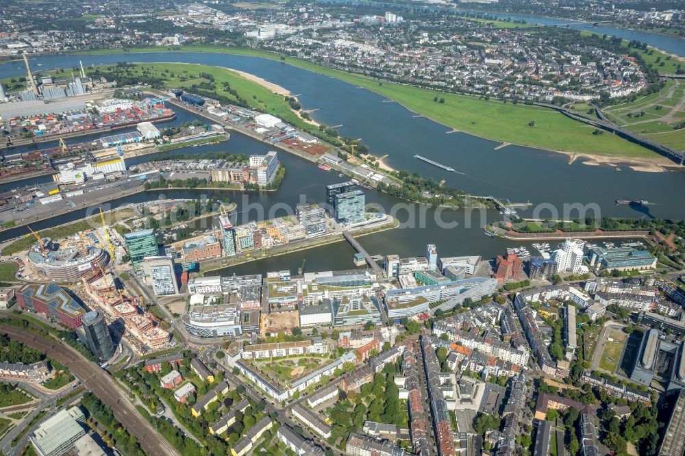 Düsseldorf from the bird's eye view: Quays and boat moorings at the port of the inland port of the Rhine river in Duesseldorf in the state North Rhine-Westphalia, Germany