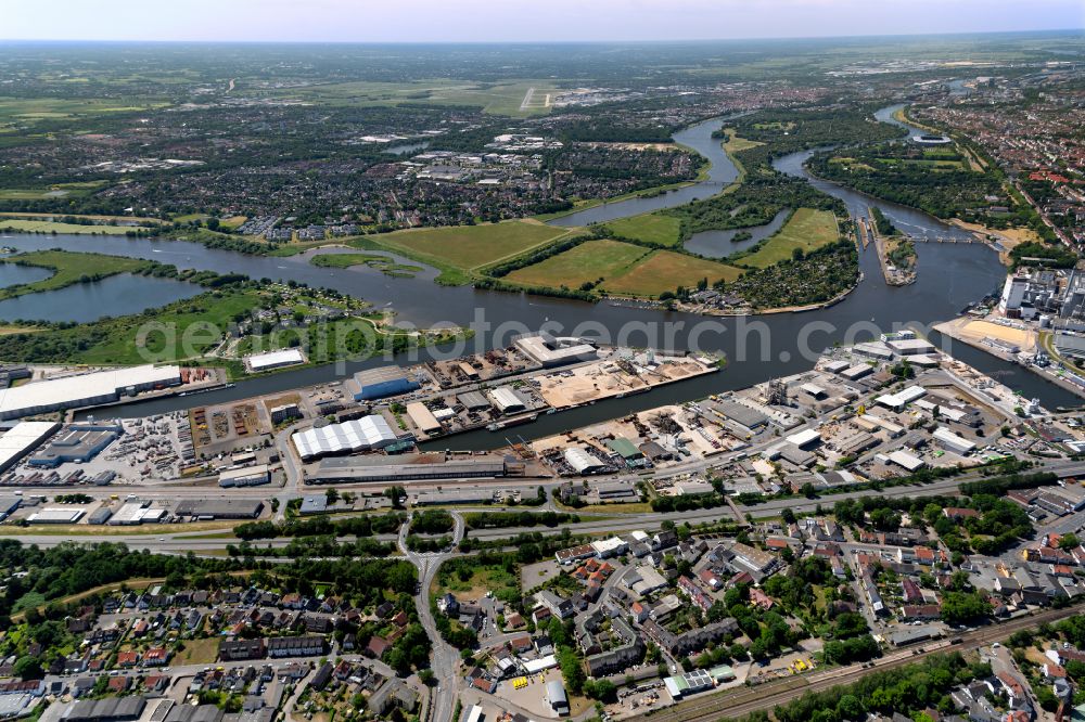 Bremen from the bird's eye view: Quays and boat moorings at the port of the inland port on shore of Weser in the district Hemelingen in Bremen, Germany