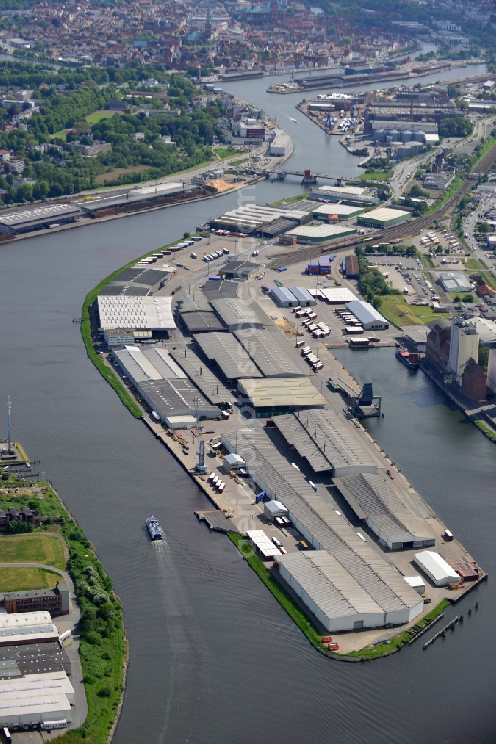 Lübeck from above - Wharves and piers with ship loading terminals in the inner harbor in Luebeck in the state Schleswig-Holstein