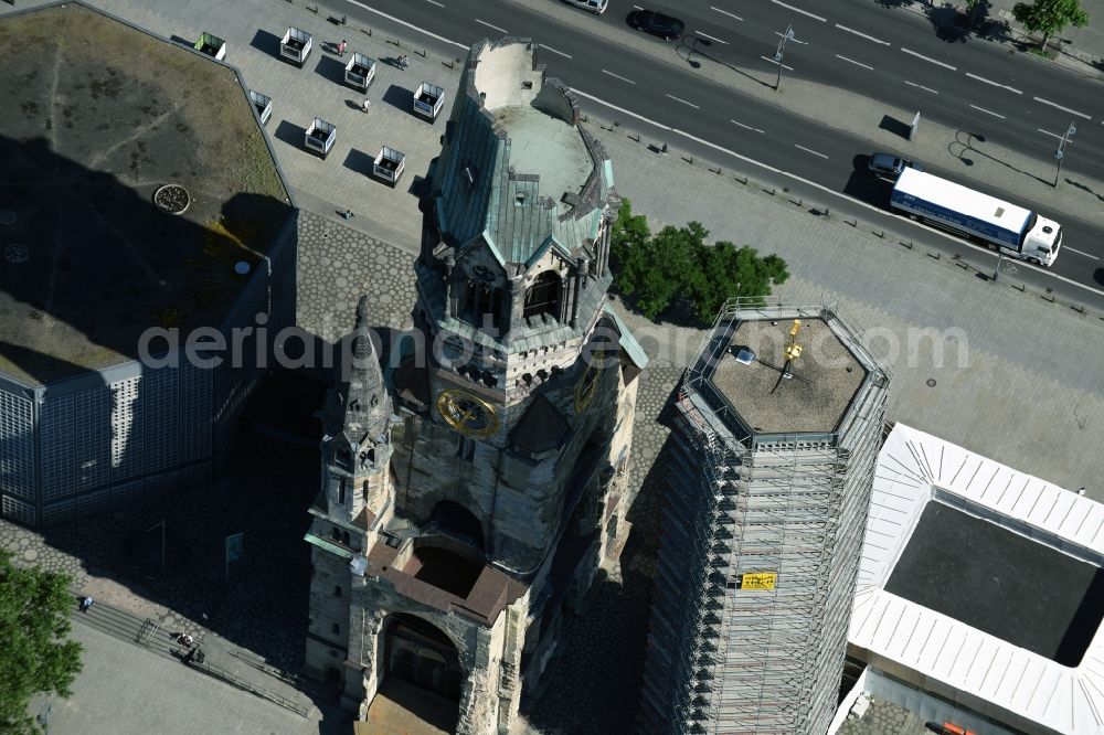 Berlin from above - The Protestant Kaiser William Memorial Church, commonly short memorial church stands on the Breitscheidplatz between the Kurfuerstendamm, the Tauentzienstrasse and the Budapest street in Berlin's Charlottenburg district. The non-damaged part of the old church is now a museum and war memorial