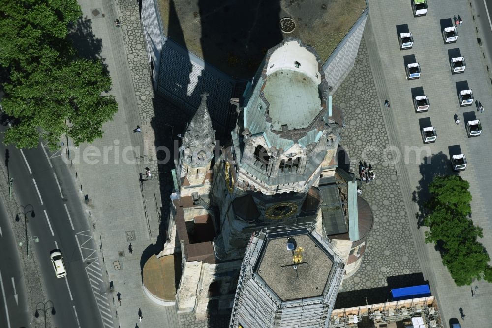 Berlin from above - The Protestant Kaiser William Memorial Church, commonly short memorial church stands on the Breitscheidplatz between the Kurfuerstendamm, the Tauentzienstrasse and the Budapest street in Berlin's Charlottenburg district. The non-damaged part of the old church is now a museum and war memorial