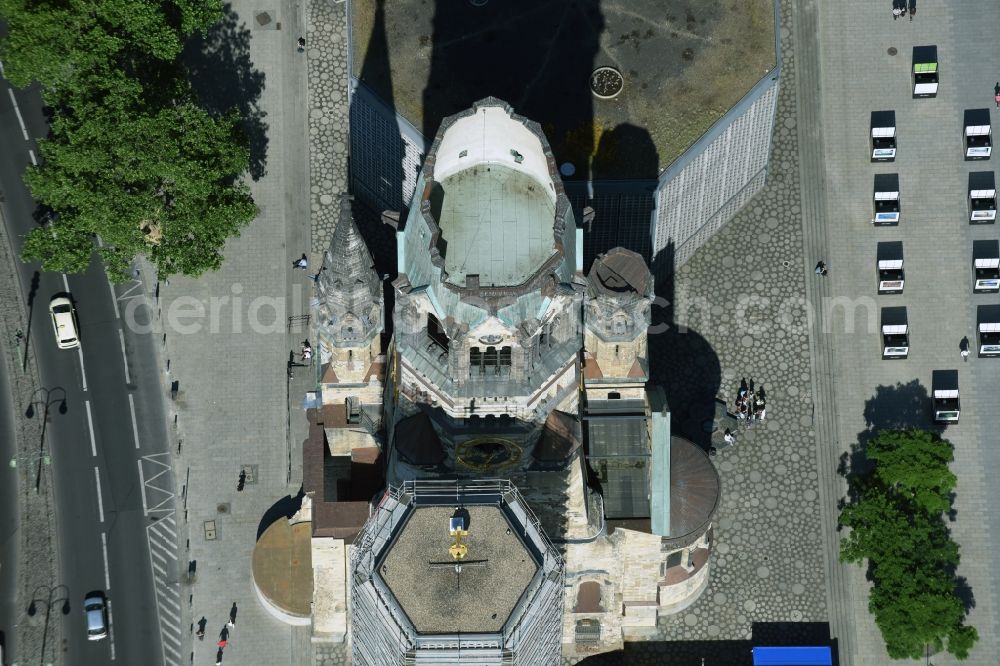 Aerial image Berlin - The Protestant Kaiser William Memorial Church, commonly short memorial church stands on the Breitscheidplatz between the Kurfuerstendamm, the Tauentzienstrasse and the Budapest street in Berlin's Charlottenburg district. The non-damaged part of the old church is now a museum and war memorial