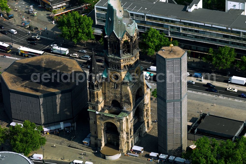 Berlin from above - The Protestant Kaiser William Memorial Church, commonly short memorial church stands on the Breitscheidplatz between the Kurfuerstendamm, the Tauentzienstrasse and the Budapest street in Berlin's Charlottenburg district. The non-damaged part of the old church is now a museum and war memorial