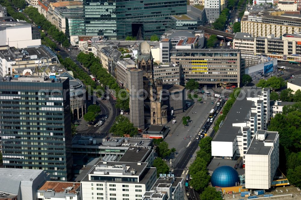 Aerial image Berlin - The Protestant Kaiser William Memorial Church, commonly short memorial church stands on the Breitscheidplatz between the Kurfuerstendamm, the Tauentzienstrasse and the Budapest street in Berlin's Charlottenburg district. The non-damaged part of the old church is now a museum and war memorial