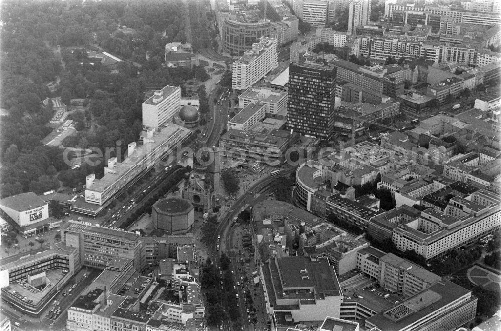 Aerial photograph Berlin - The Protestant Kaiser William Memorial Church (colloquially known Memorial Church and in Berlin dialect called Hollow Tooth) is located at Breitscheidplatz between the Kurfuerstendamm, the Tauentzienstrasse and the Budapest street in Berlin's Charlottenburg district