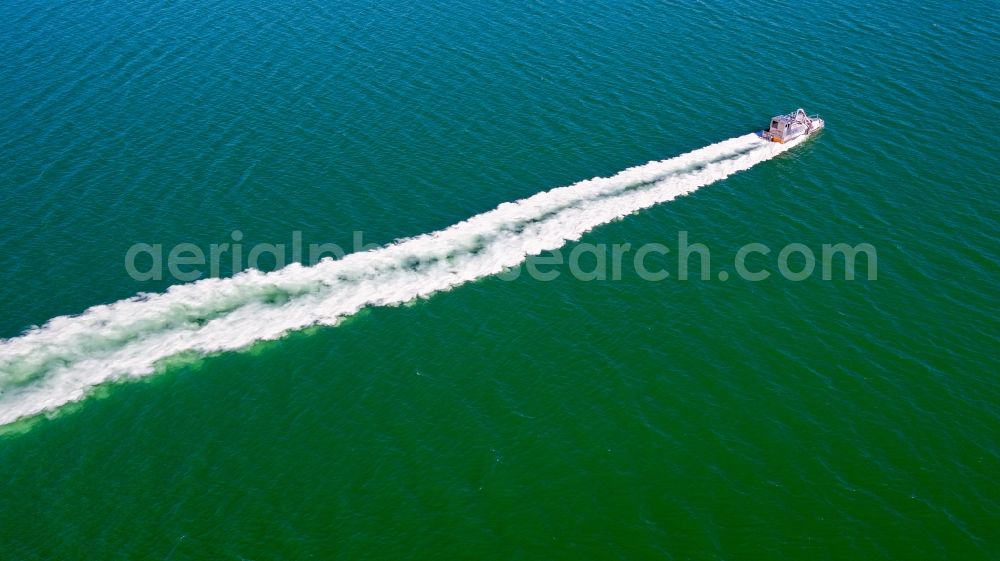 Aerial image Großpösna - Lime boat specialized vessel in driving on Stoermthaler See in Grosspoesna in the state Saxony, Germany