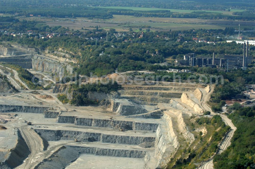 Rüdersdorf from above - Blick auf den Kalksteinbruch Rüdersdorf östlich von Berlin, auf dem südlichen Barnim gelegen, er ist der größte geologische Aufschluss in Norddeutschland aus dem Erdmittelalter, entstanden durch Kalkabbau, bestehend aus einem Museumspark Baustoffindustrie Rüdersdorf und dem eigentlichen Kalksteinbruch.