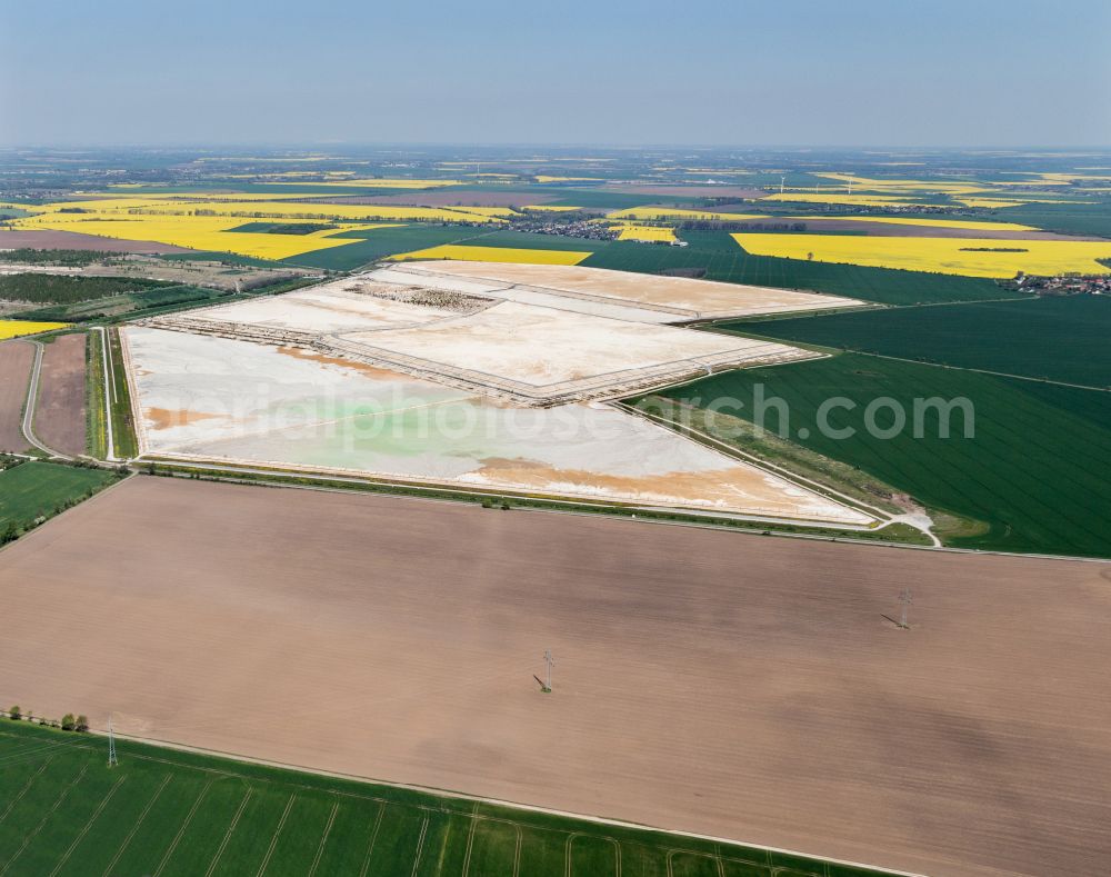 Aerial photograph Nienburg (Saale) - Limestone ponds and sewage treatment plant tank of FA. Solvay in Nienburg (Saale) in Saxony-Anhalt to the introduction of lime sludge from the production of soda