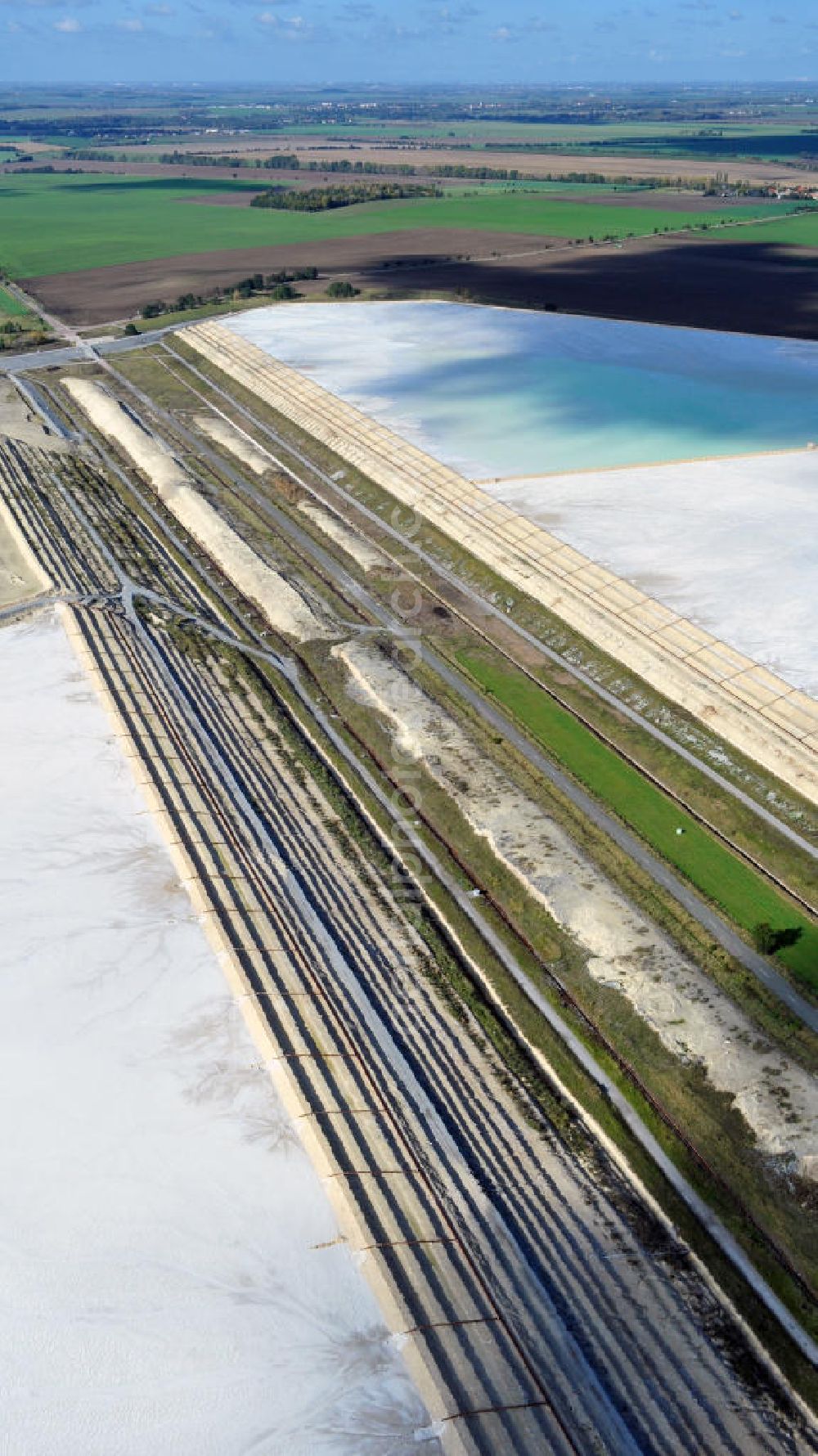 Aerial photograph Nienburg ( Saale ) OT Latdorf - The Solvay Chemicals GmbH operates stabilization ponds in Latdorf in Saxony-Anhalt for the purification of calcareous waste water from the lime-soda ash production