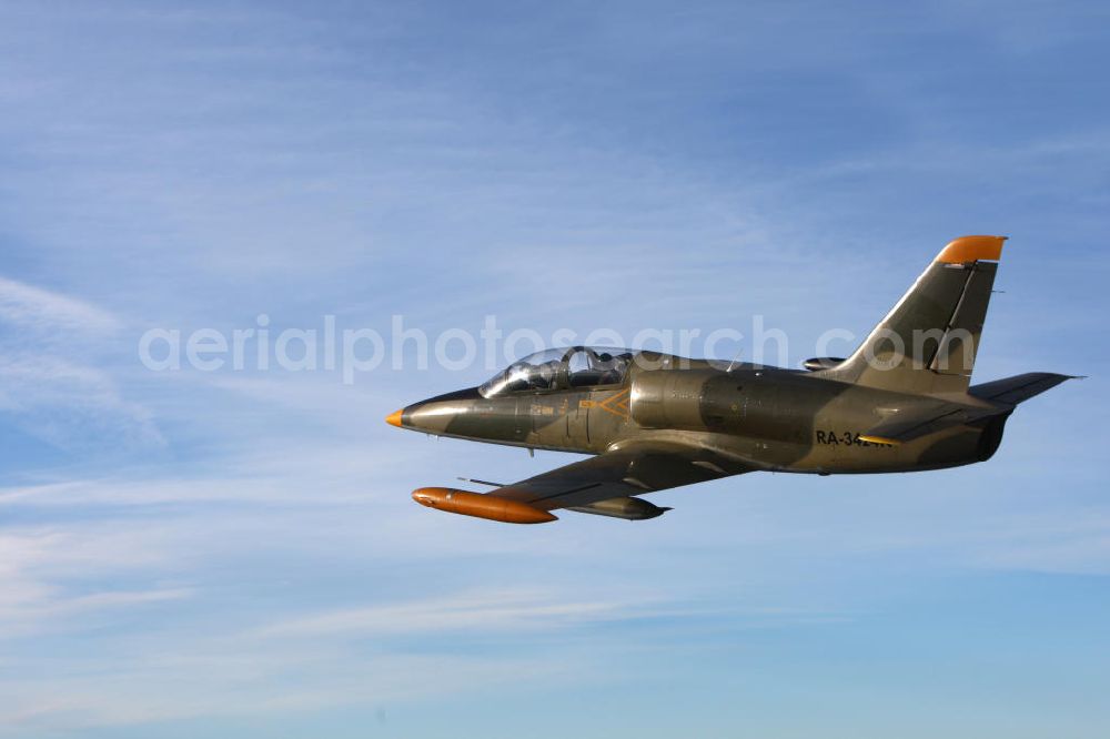 Bitburg from above - Kampfjet Aero L-39 Albatros auf dem Flugplatz Bitburg EDRB / Rheinland-Pfalz. Die L-39 war ursprünglich als einstrahliges Schulflugzeug der tschechischen Luftstreitkräfte entwickelt worden. Jet fighter Aero L-39 Albatros at the airfield Bitburg / Rhineland-Palatinate.