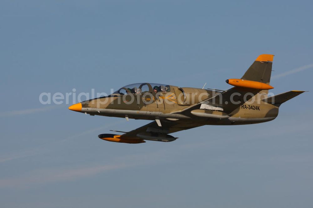 Bitburg from above - Kampfjet Aero L-39 Albatros auf dem Flugplatz Bitburg EDRB / Rheinland-Pfalz. Die L-39 war ursprünglich als einstrahliges Schulflugzeug der tschechischen Luftstreitkräfte entwickelt worden. Jet fighter Aero L-39 Albatros at the airfield Bitburg / Rhineland-Palatinate.