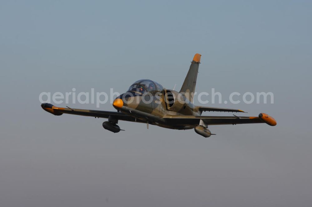 Aerial image Bitburg - Kampfjet Aero L-39 Albatros auf dem Flugplatz Bitburg EDRB / Rheinland-Pfalz. Die L-39 war ursprünglich als einstrahliges Schulflugzeug der tschechischen Luftstreitkräfte entwickelt worden. Jet fighter Aero L-39 Albatros at the airfield Bitburg / Rhineland-Palatinate.