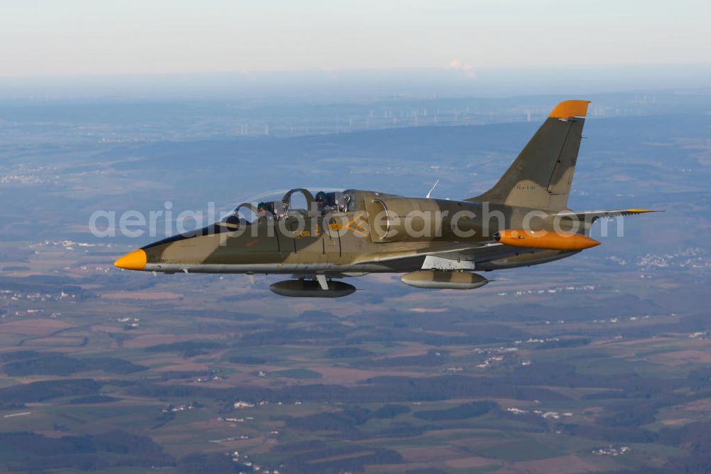 Bitburg from above - Kampfjet Aero L-39 Albatros auf dem Flugplatz Bitburg EDRB / Rheinland-Pfalz. Die L-39 war ursprünglich als einstrahliges Schulflugzeug der tschechischen Luftstreitkräfte entwickelt worden. Jet fighter Aero L-39 Albatros at the airfield Bitburg / Rhineland-Palatinate.