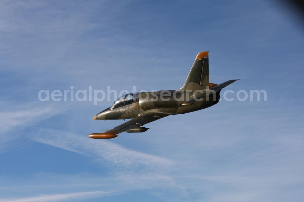 Aerial image Bitburg - Kampfjet Aero L-39 Albatros auf dem Flugplatz Bitburg EDRB / Rheinland-Pfalz. Die L-39 war ursprünglich als einstrahliges Schulflugzeug der tschechischen Luftstreitkräfte entwickelt worden. Jet fighter Aero L-39 Albatros at the airfield Bitburg / Rhineland-Palatinate.