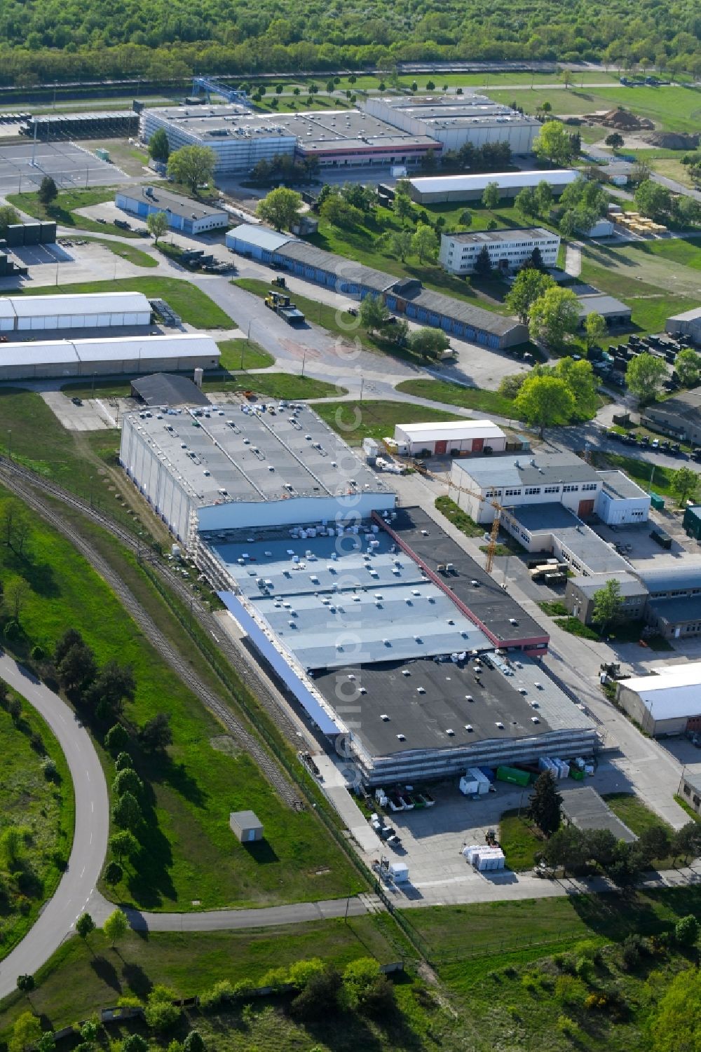 Zeithain from the bird's eye view: Building and production halls on the premises of Kampfmittelbeseitigungsdienst KMBD in Zeithain in the state Saxony, Germany