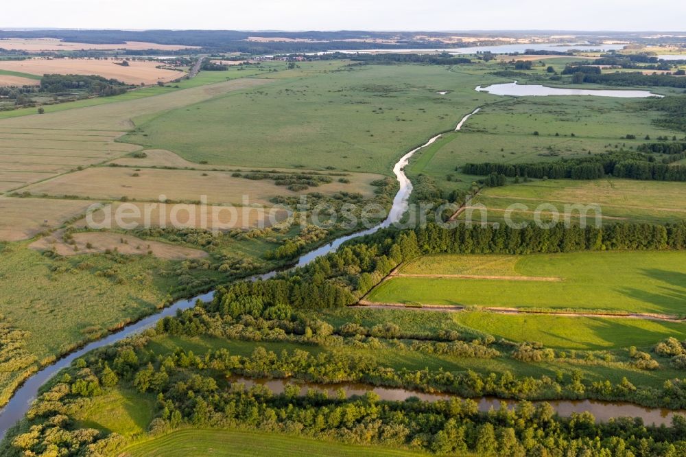 Aerial image Seelübbe - Channel flow and river banks of the waterway shipping canal between Ober- and Unteruckersee in Seeluebbe in the state Brandenburg, Germany